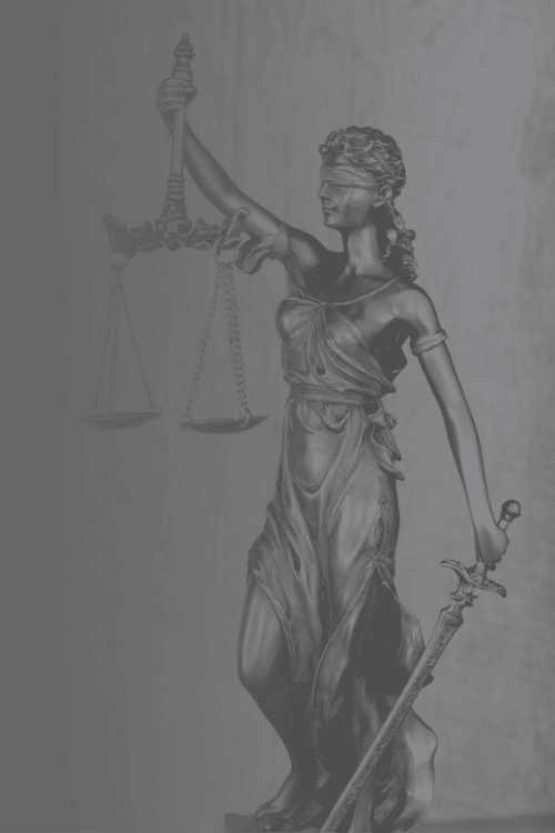 Law figure holding scales